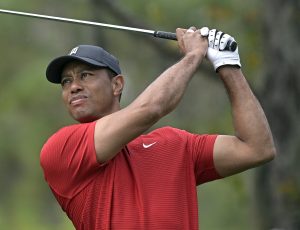 Tiger Woods swinging golf club