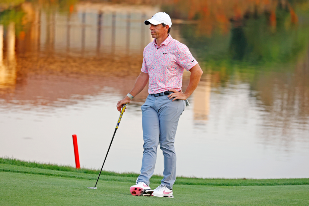 golfer standing on putting green